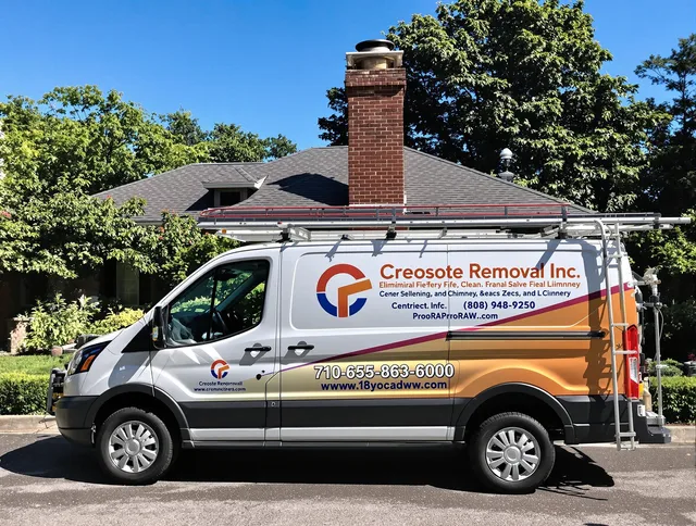 Fort Mill Chimney Sweep technician removing creosote safely in Fort Mill, SC