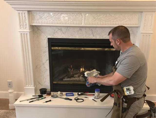 Fort Mill Chimney Sweep performing fireplace maintenance in Fort Mill, SC